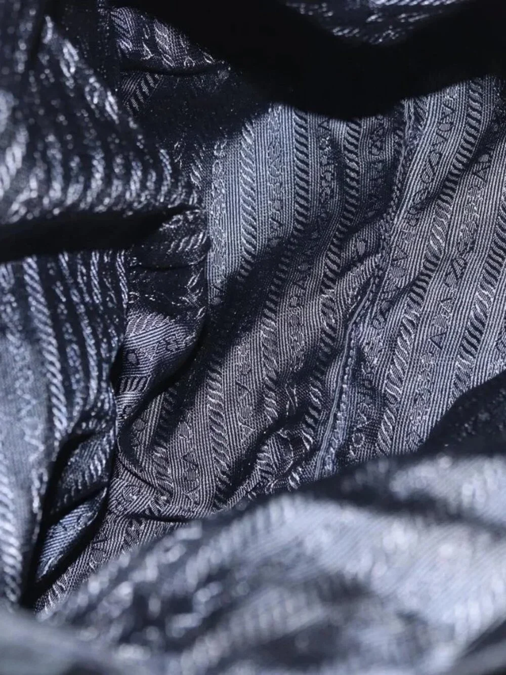 Prada brand	prada color	black